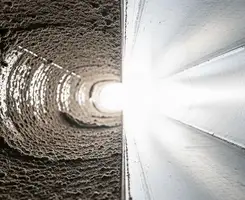 air duct cleaning services showing interior duct system inspection and cleaning in Fresno, CA